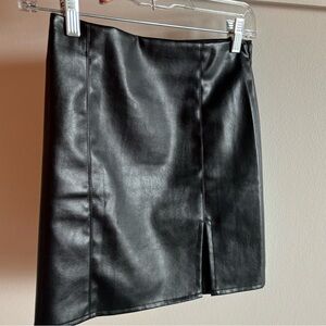 NAANAA faux leather black skirt with slit